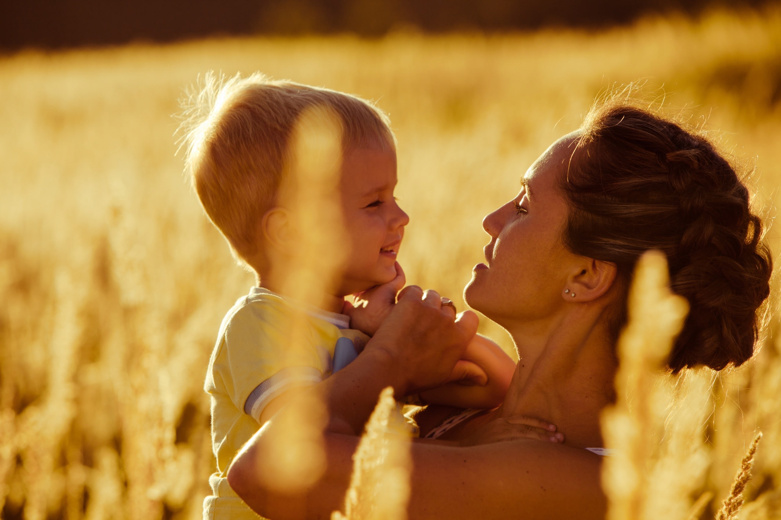 Summer portrait of mother and son on nature